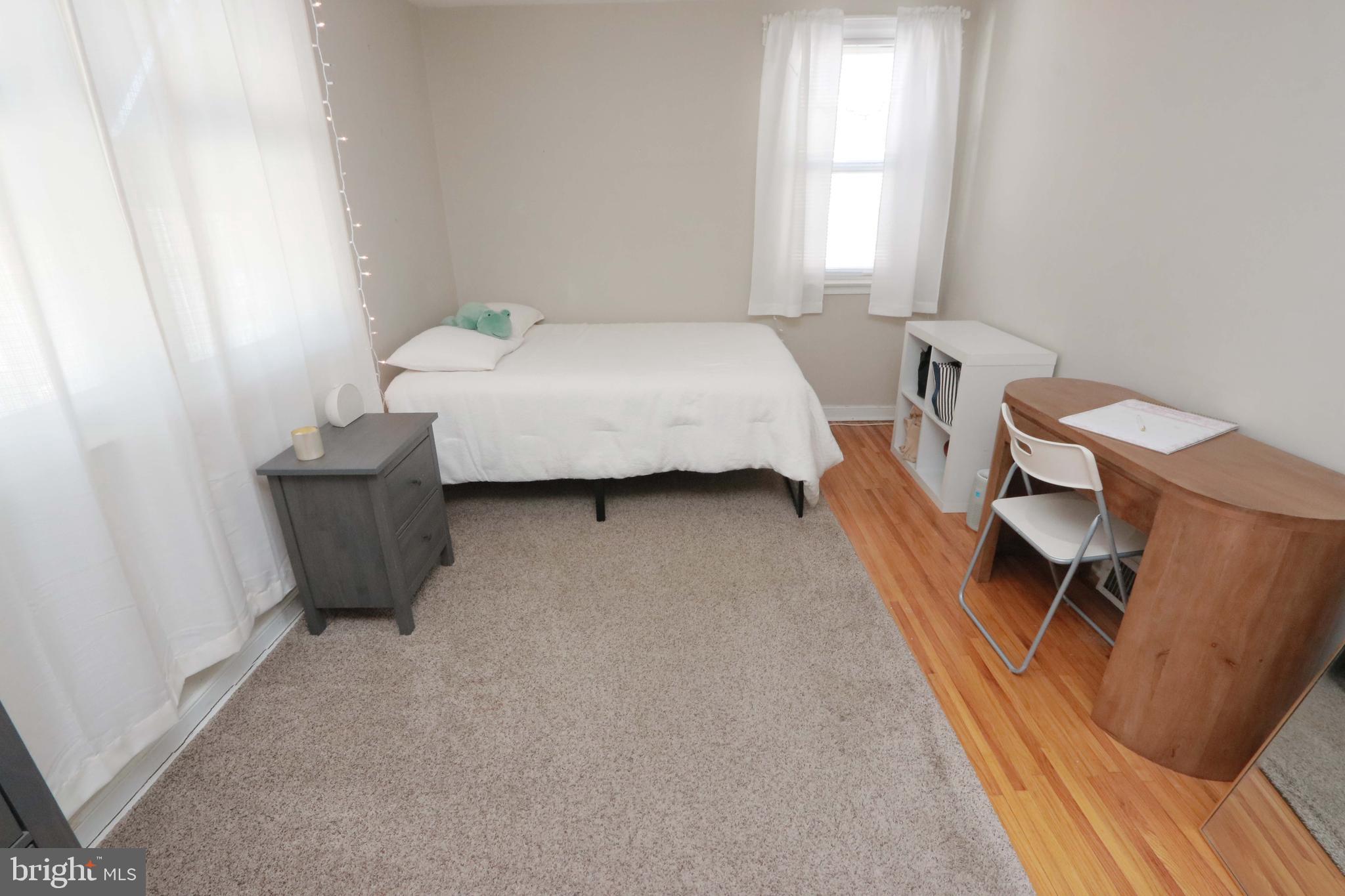 8134 Revere Street Philadelphia, PA 19152 - Photo 29 of 49 a bedroom with a bed and furniture