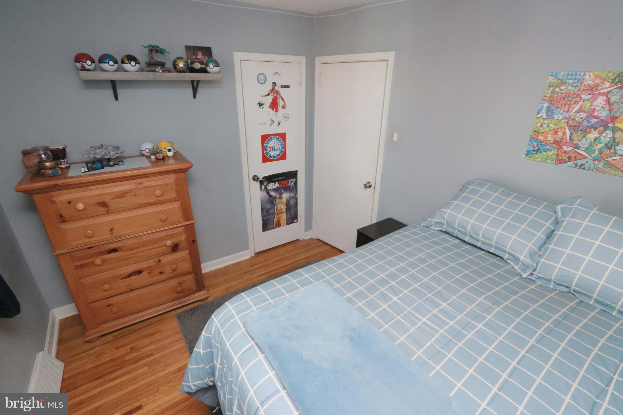 8134 Revere Street Philadelphia, PA 19152 - Photo 34 of 49 a bedroom with a bed and dresser