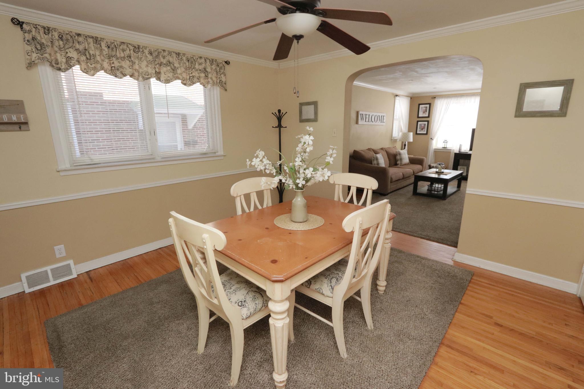 8134 Revere Street Philadelphia, PA 19152 - Photo 10 of 49 a view of a dining room with furniture window and wooden floor