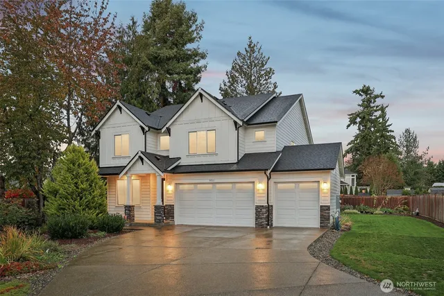 a front view of house with yard and outdoor seating