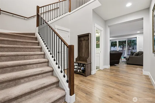 a view of a hallway view with staircase