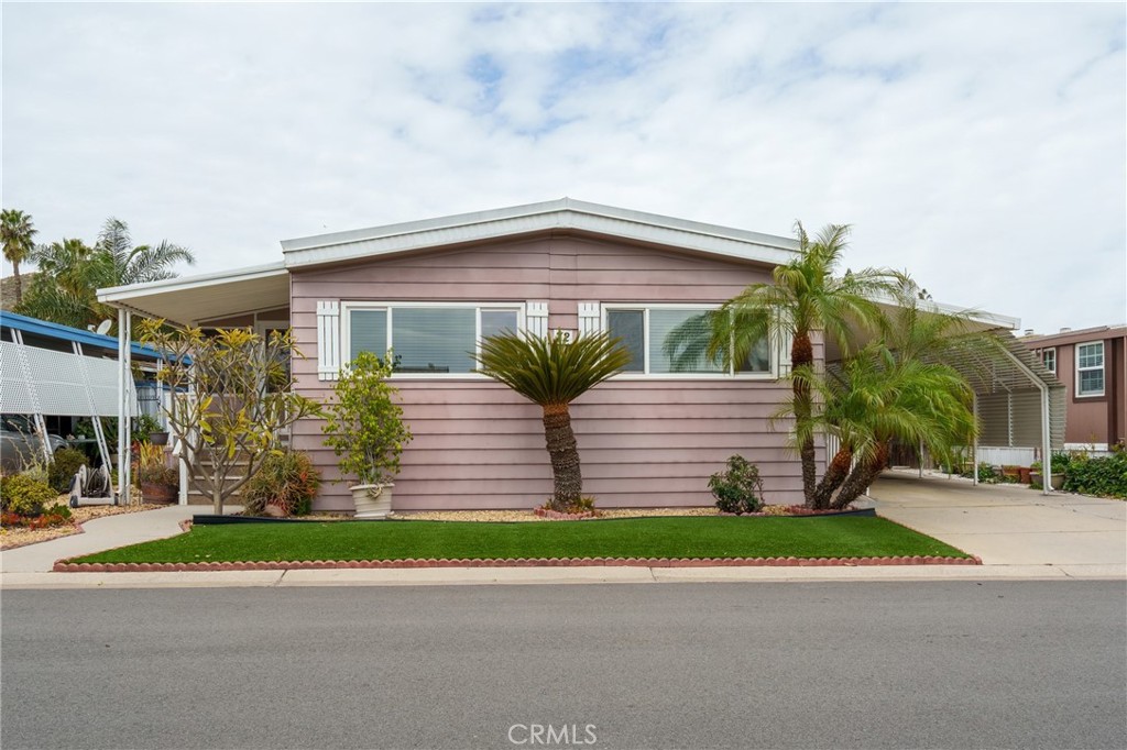4000 Pierce Street, Unit 72 Riverside, CA 92505 - Photo 20 of 20 a view of a house with a yard and road