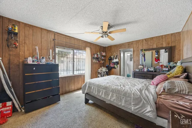a bedroom with a bed and a walk in closet