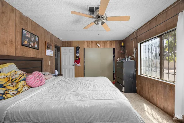 a bathroom with a double vanity sink mirror and shower