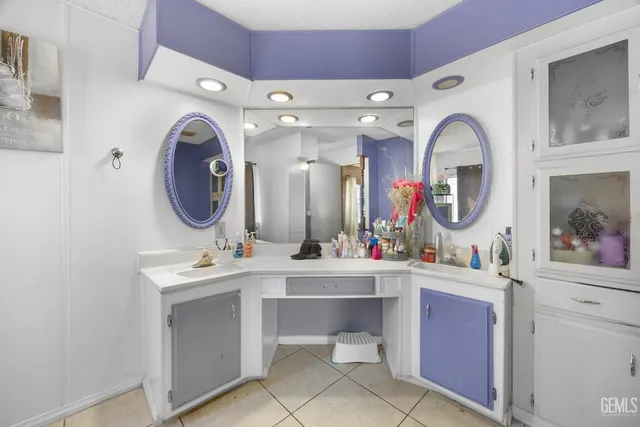 a bedroom with bunk beds and a baby crib