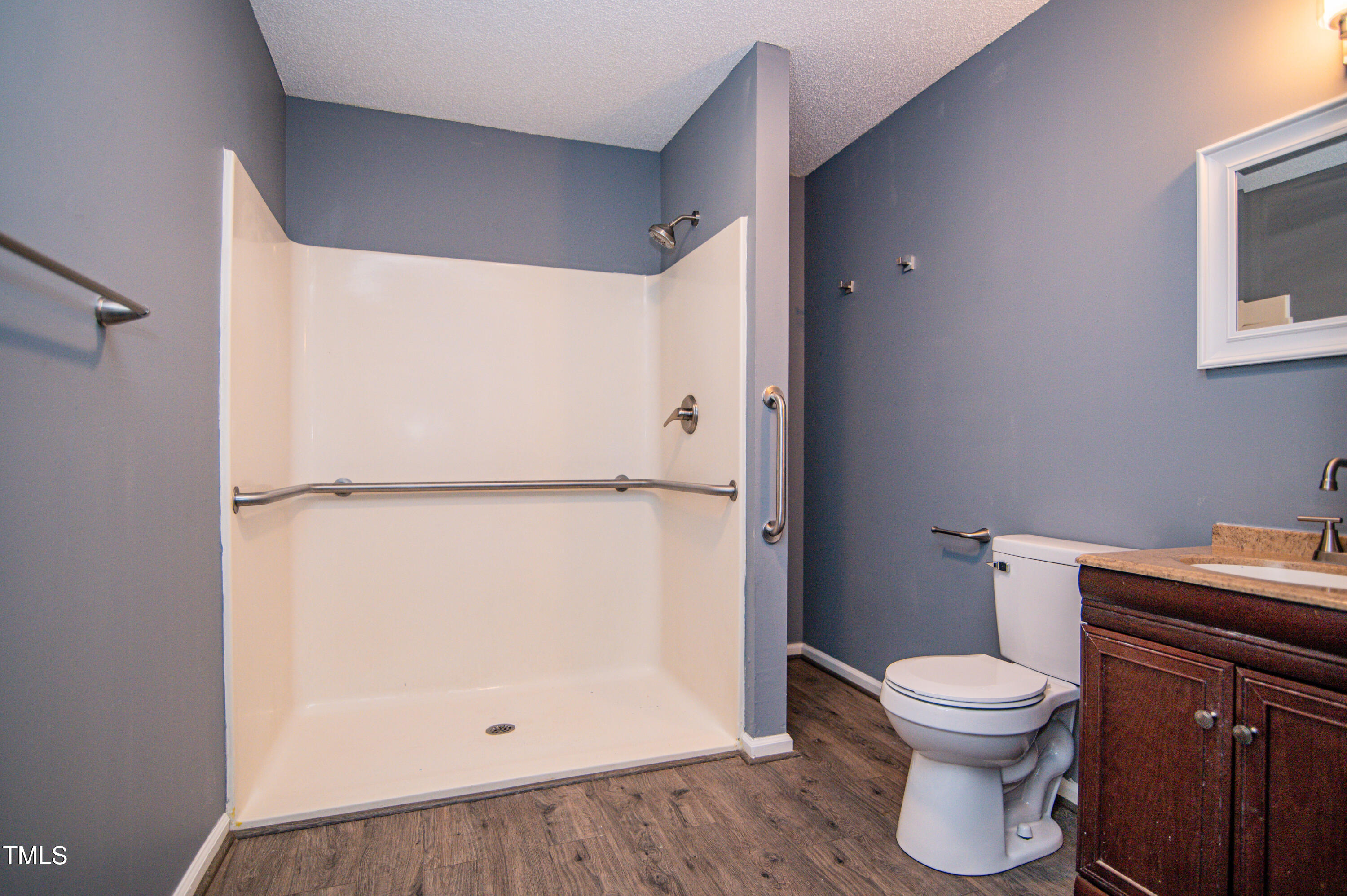 5046 Mrs Mag Road Conway, NC 27820 - Photo 19 of 38 a white toilet sitting next to a bathroom sink