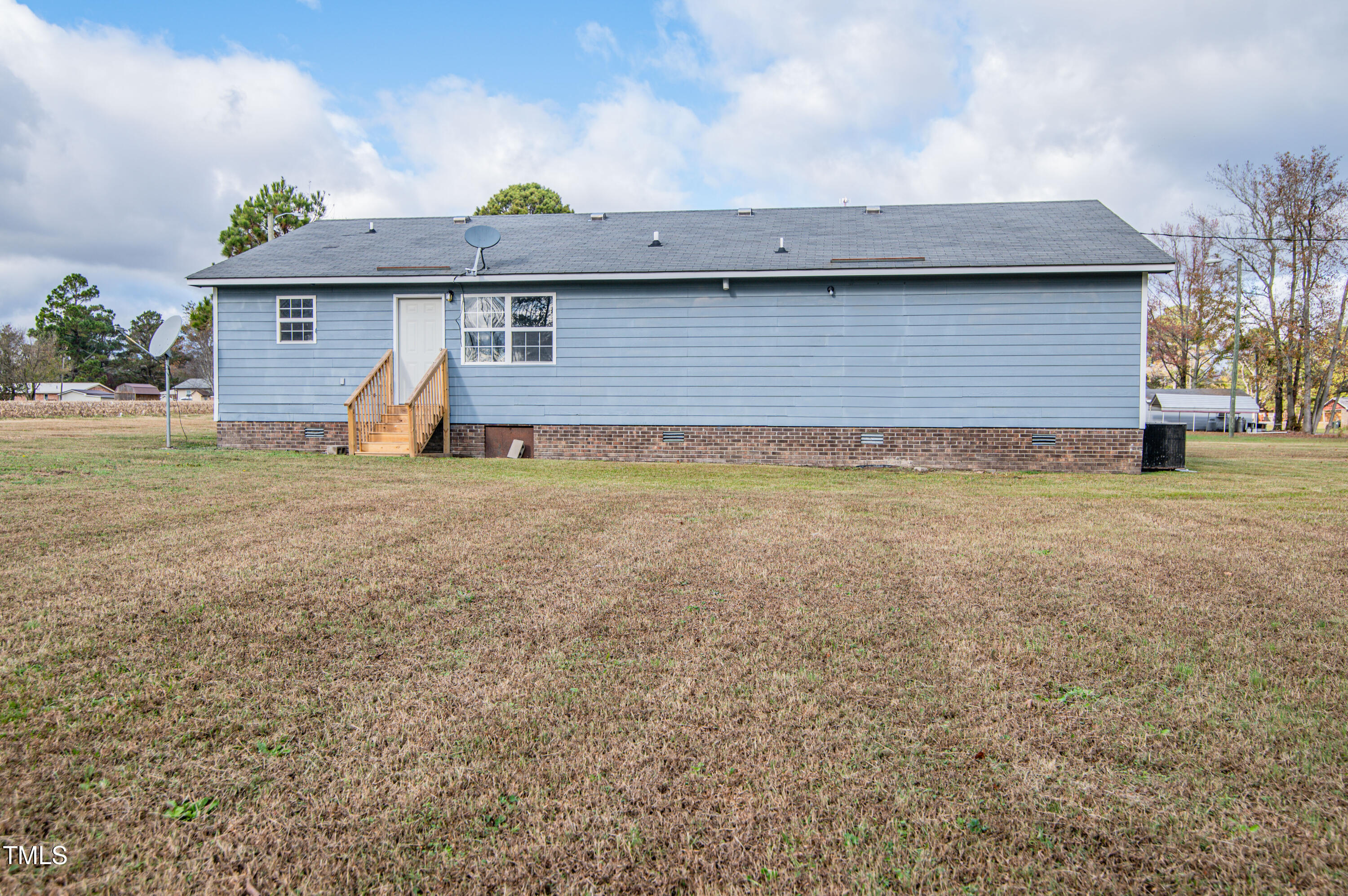 5046 Mrs Mag Road Conway, NC 27820 - Photo 32 of 38 a view of a backyard with a garden and plants