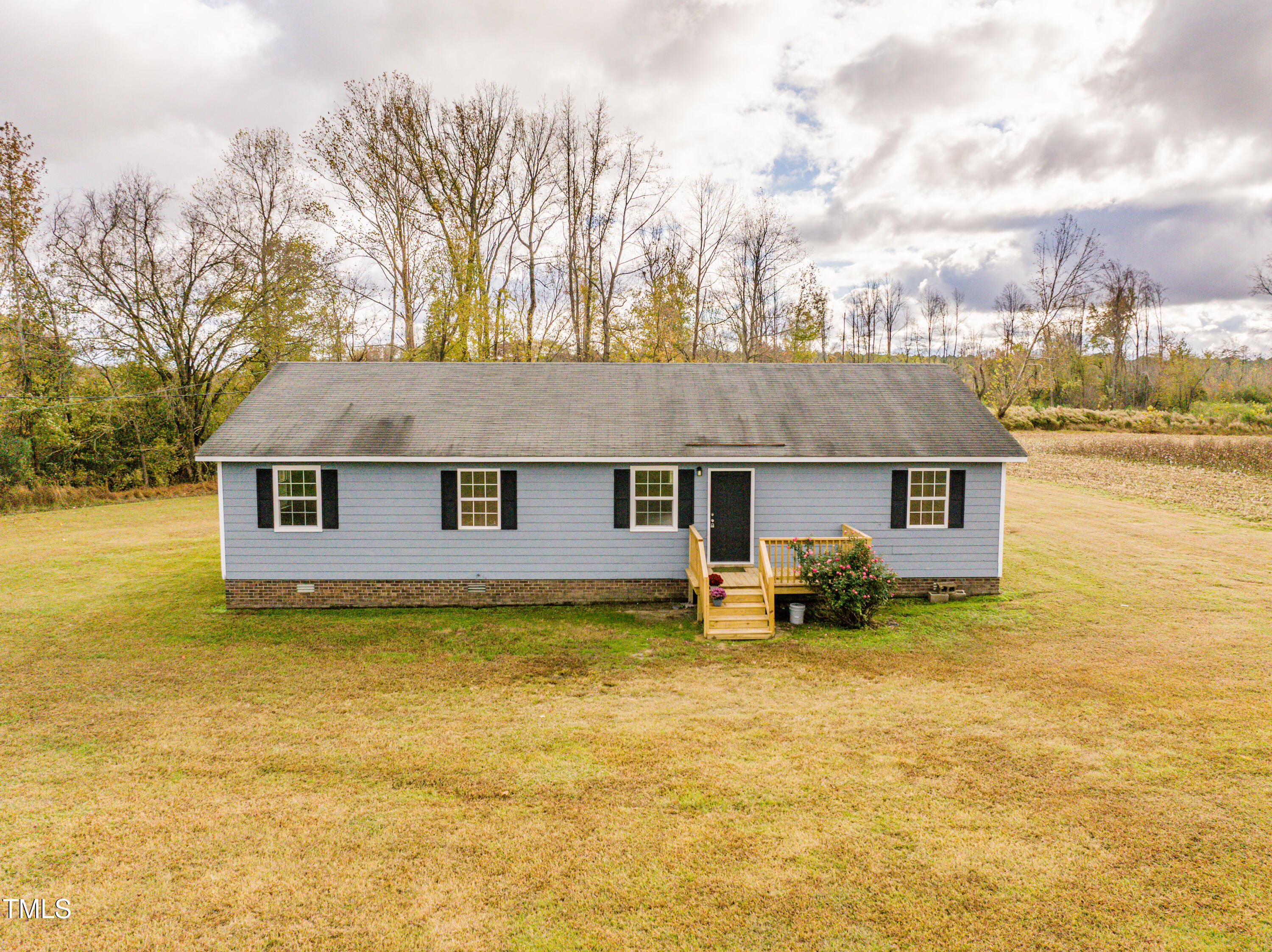 5046 Mrs Mag Road Conway, NC 27820 - Photo 38 of 38 a house view with swimming pool in front of it