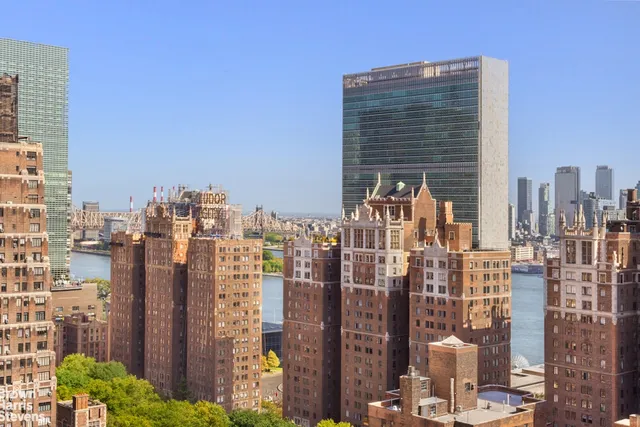 a view of a city with tall buildings