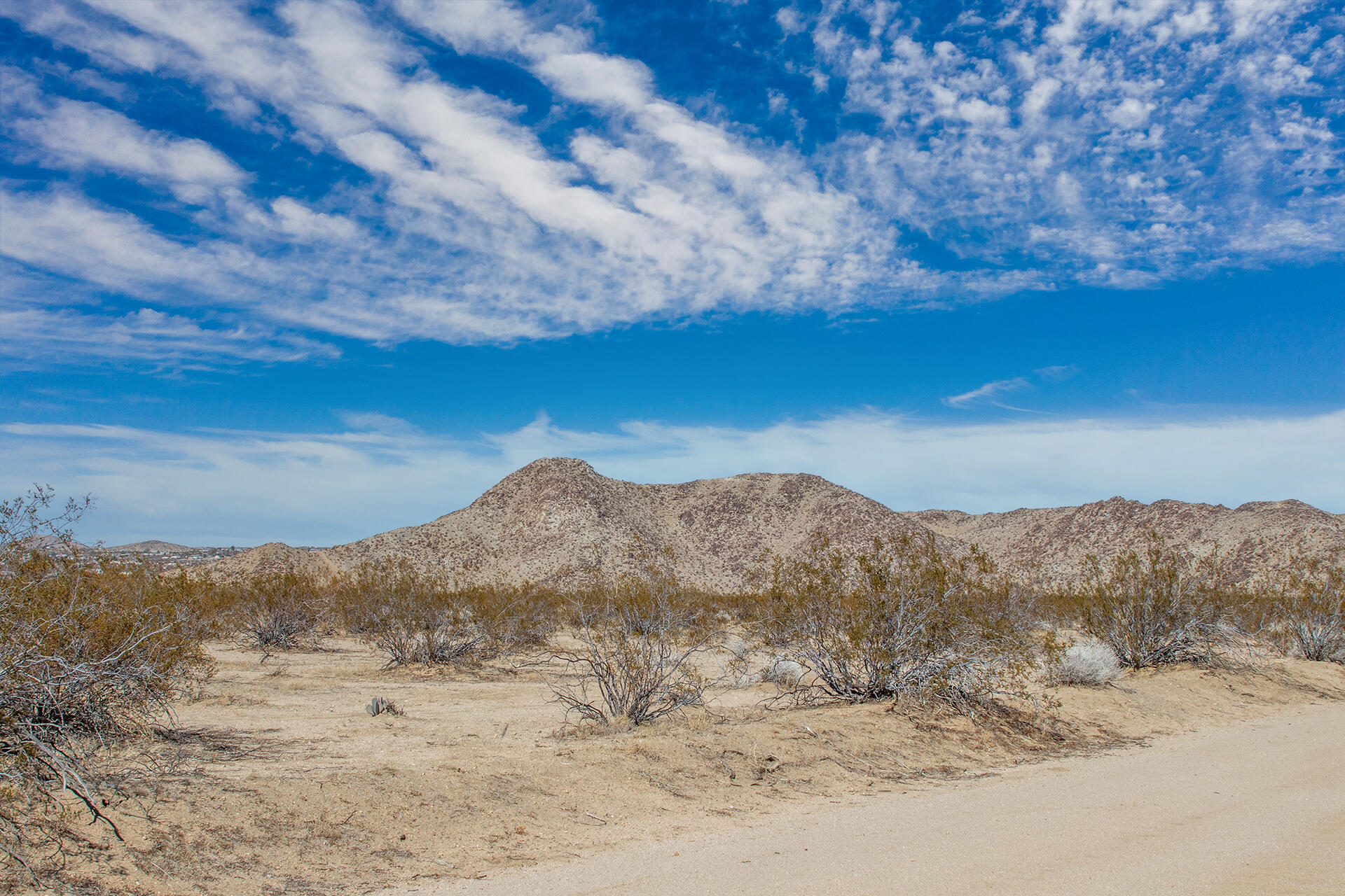 63682 Broadway Joshua Tree, CA 92252 - Photo 2 of 22 a view of mountain view with mountains in the background