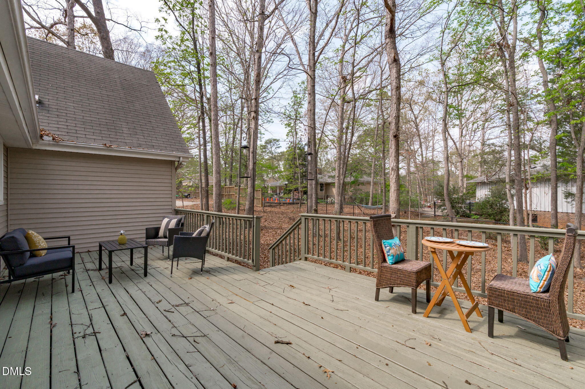 3304 Wade Avenue Raleigh, NC 27607 - Photo 29 of 38 a roof deck with table and chairs and wooden floor