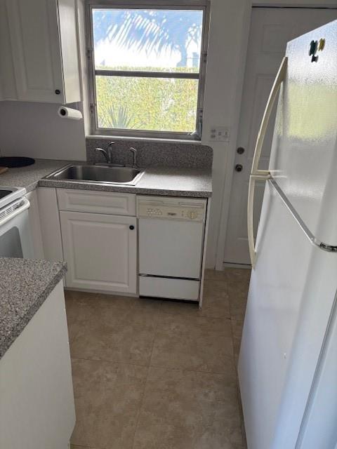 3096 Cadiz Road Boca Raton, FL 33432 - Photo 7 of 14 a bathroom with a granite countertop sink and a window