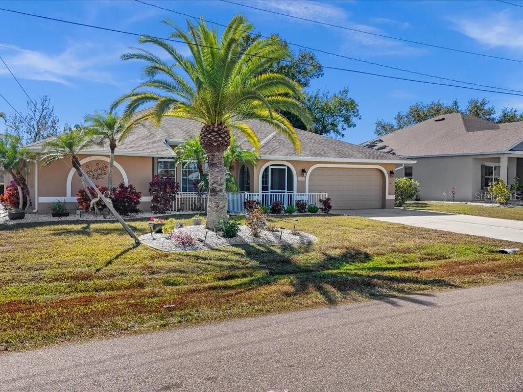 25263 Padre Lane Punta Gorda, FL 33983 - Photo 3 of 60 a view of swimming pool with outdoor seating