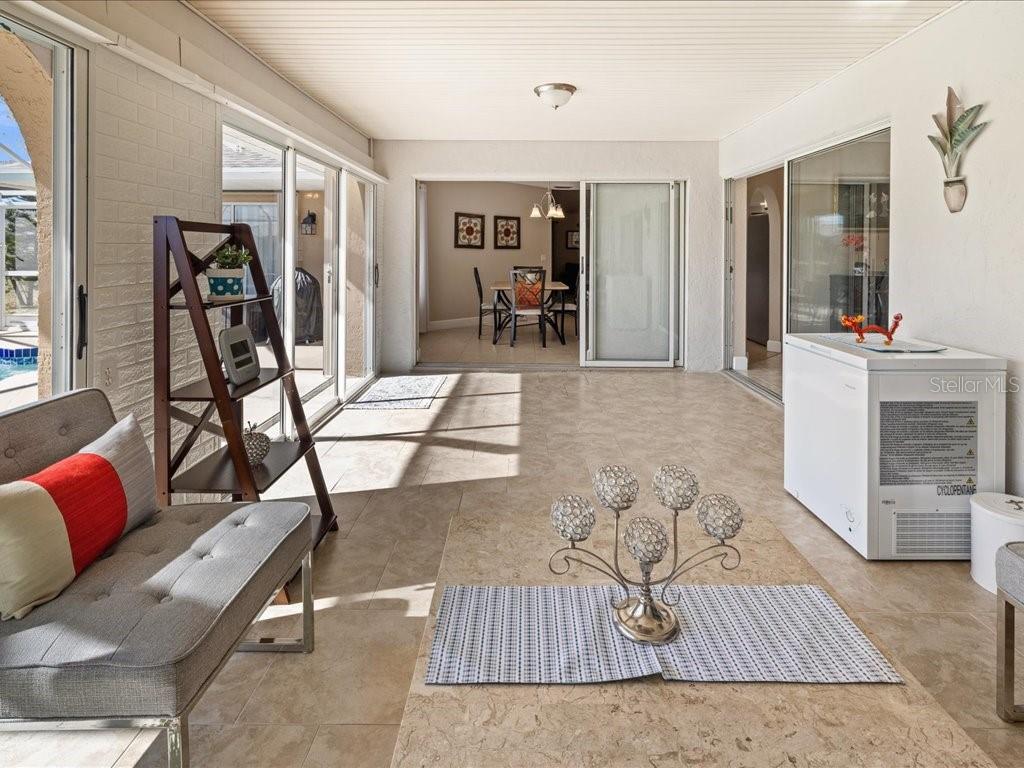 25263 Padre Lane Punta Gorda, FL 33983 - Photo 38 of 60 a living room with furniture and a wooden floor