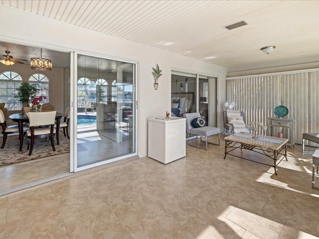 25263 Padre Lane Punta Gorda, FL 33983 - Photo 39 of 60 a living room with furniture and a table