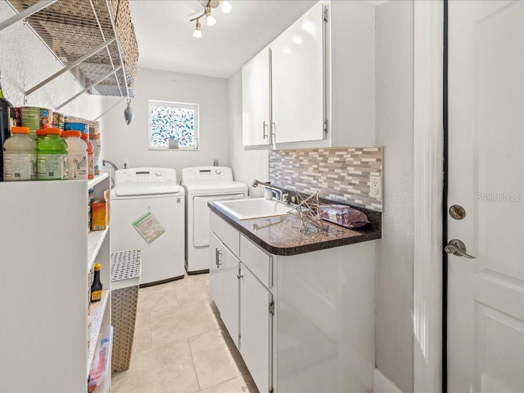 25263 Padre Lane Punta Gorda, FL 33983 - Photo 44 of 60 a utility room with dryer and washer