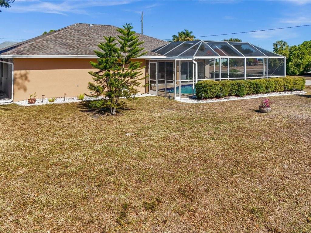 25263 Padre Lane Punta Gorda, FL 33983 - Photo 48 of 60 a view of a house with a yard