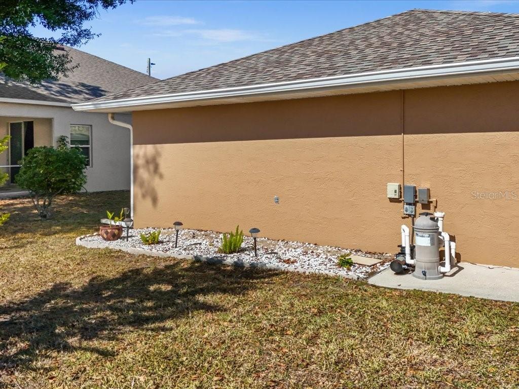 25263 Padre Lane Punta Gorda, FL 33983 - Photo 50 of 60 a bathroom with a granite countertop sink and a mirror