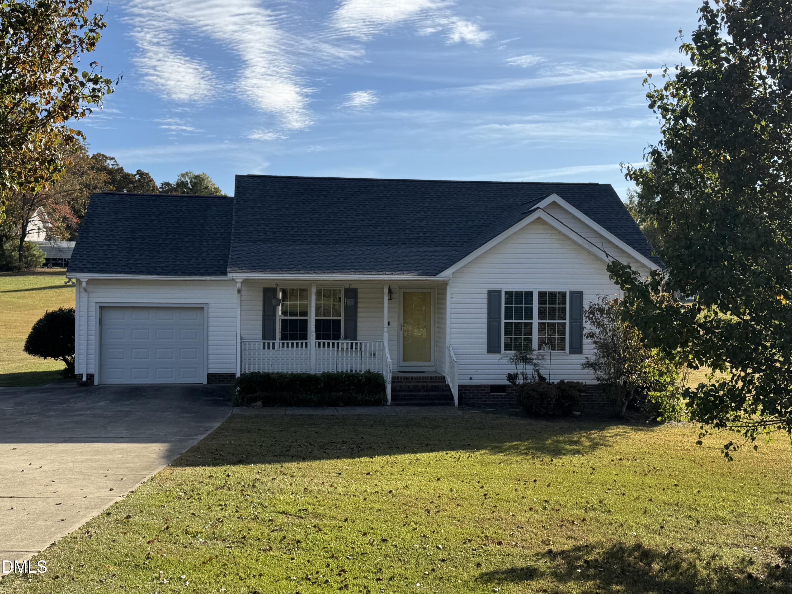 1318 Bobbitt Road Kittrell, NC 27544 - Photo 1 of 15 a front view of a house with a yard