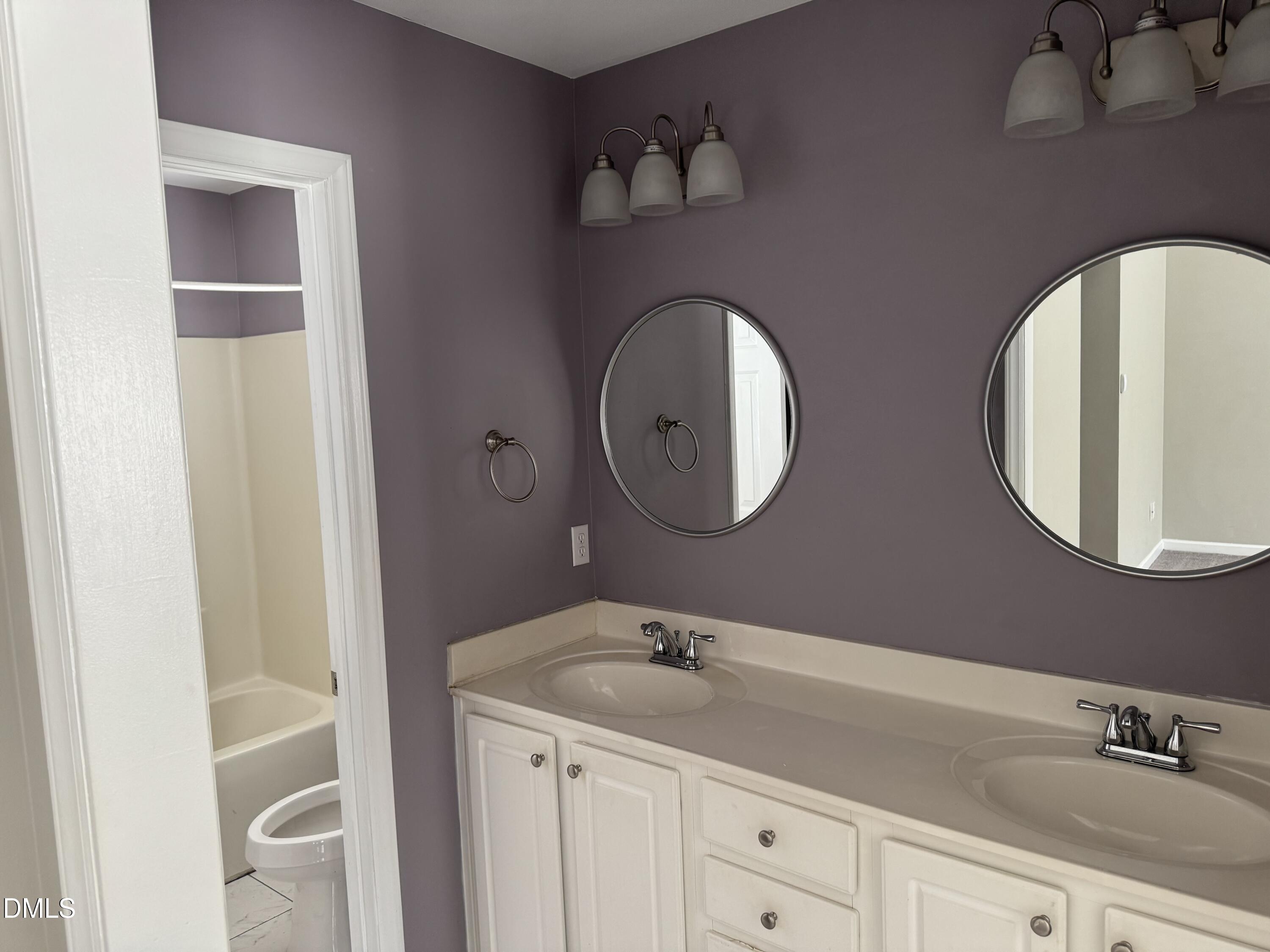 1318 Bobbitt Road Kittrell, NC 27544 - Photo 10 of 15 a bathroom with a sink and a mirror