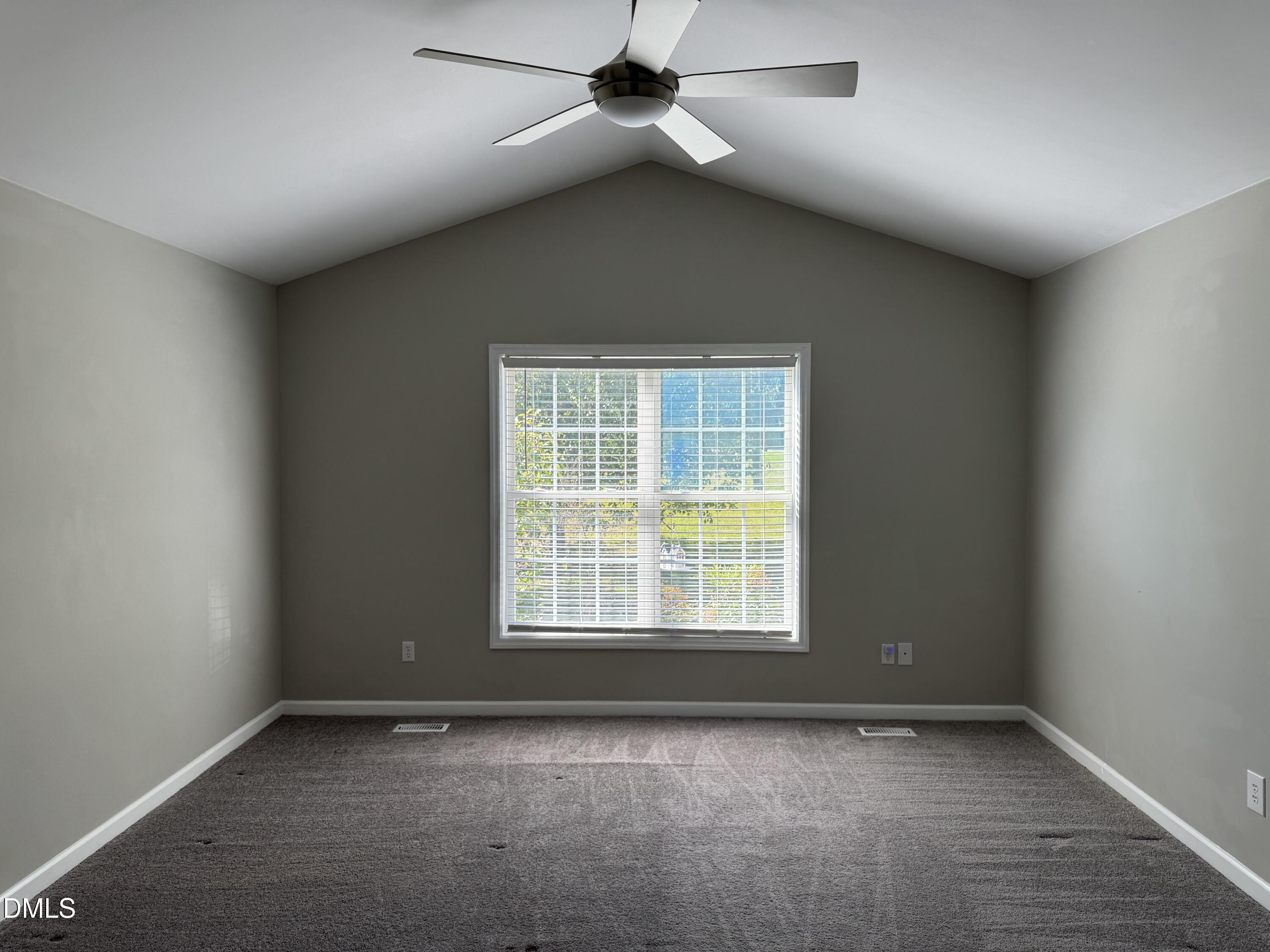 1318 Bobbitt Road Kittrell, NC 27544 - Photo 11 of 15 an empty room with a empty space and windows
