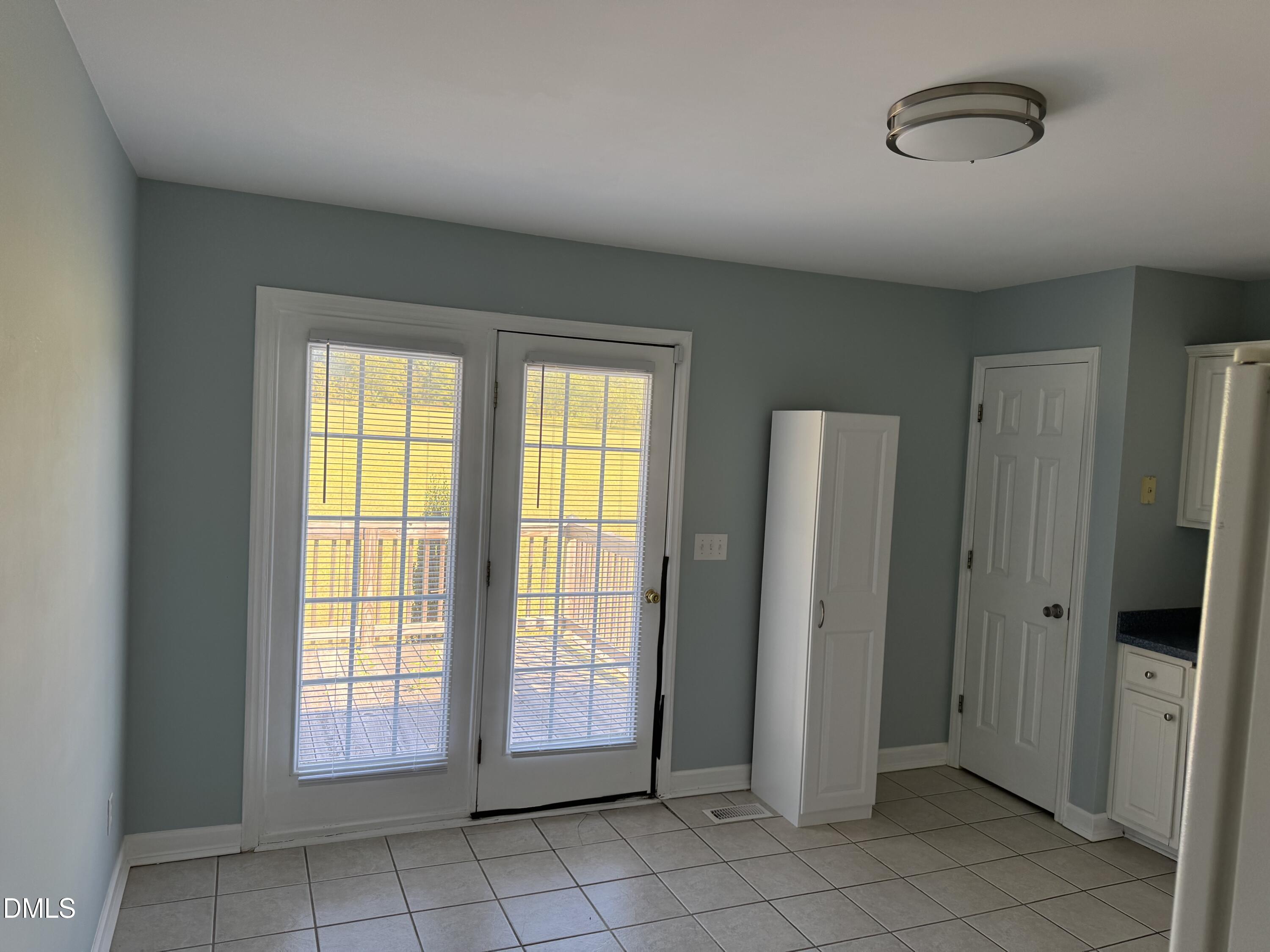1318 Bobbitt Road Kittrell, NC 27544 - Photo 7 of 15 an empty room with windows and closet