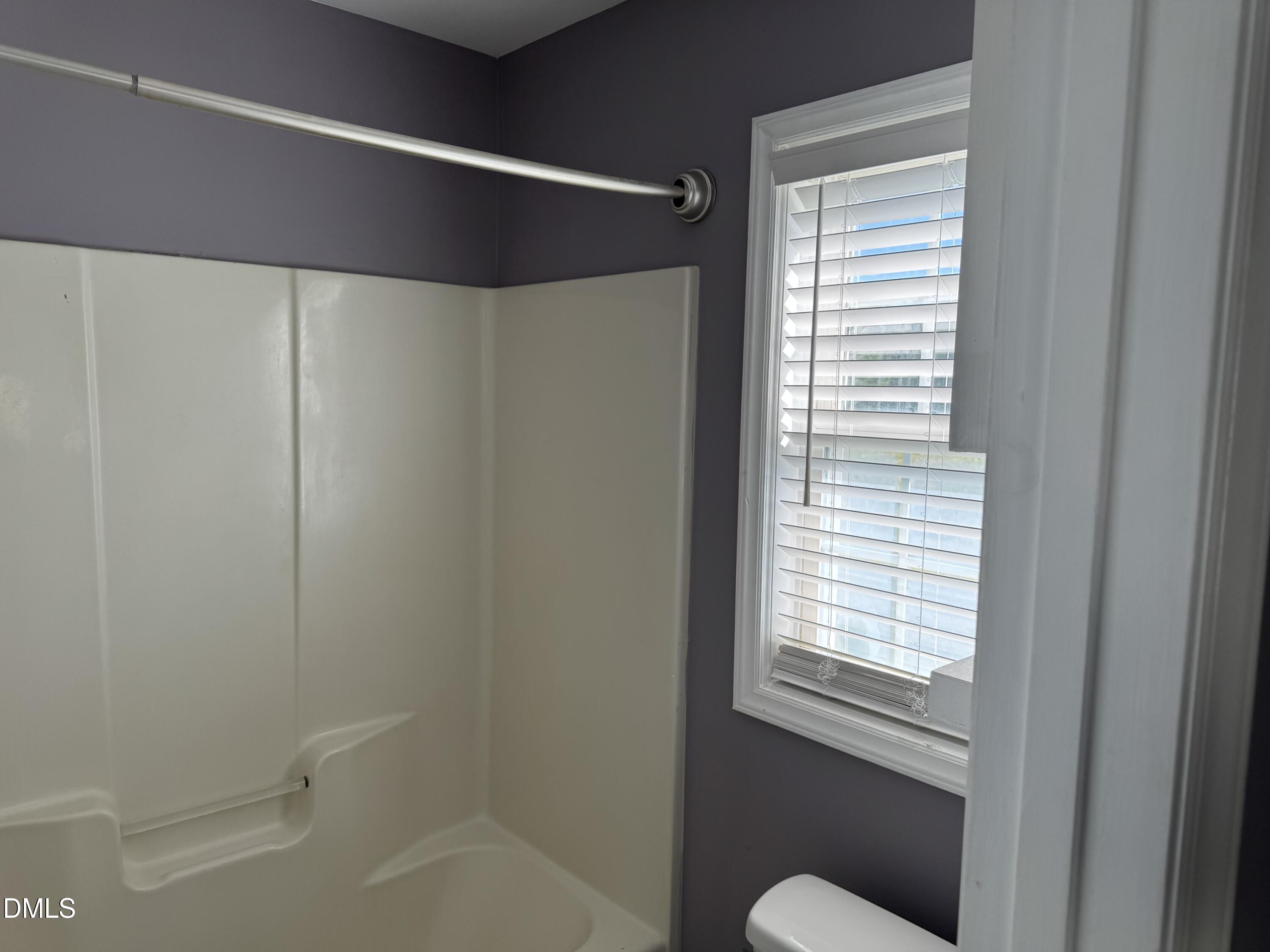 1318 Bobbitt Road Kittrell, NC 27544 - Photo 9 of 15 a bathroom with a window and a shower