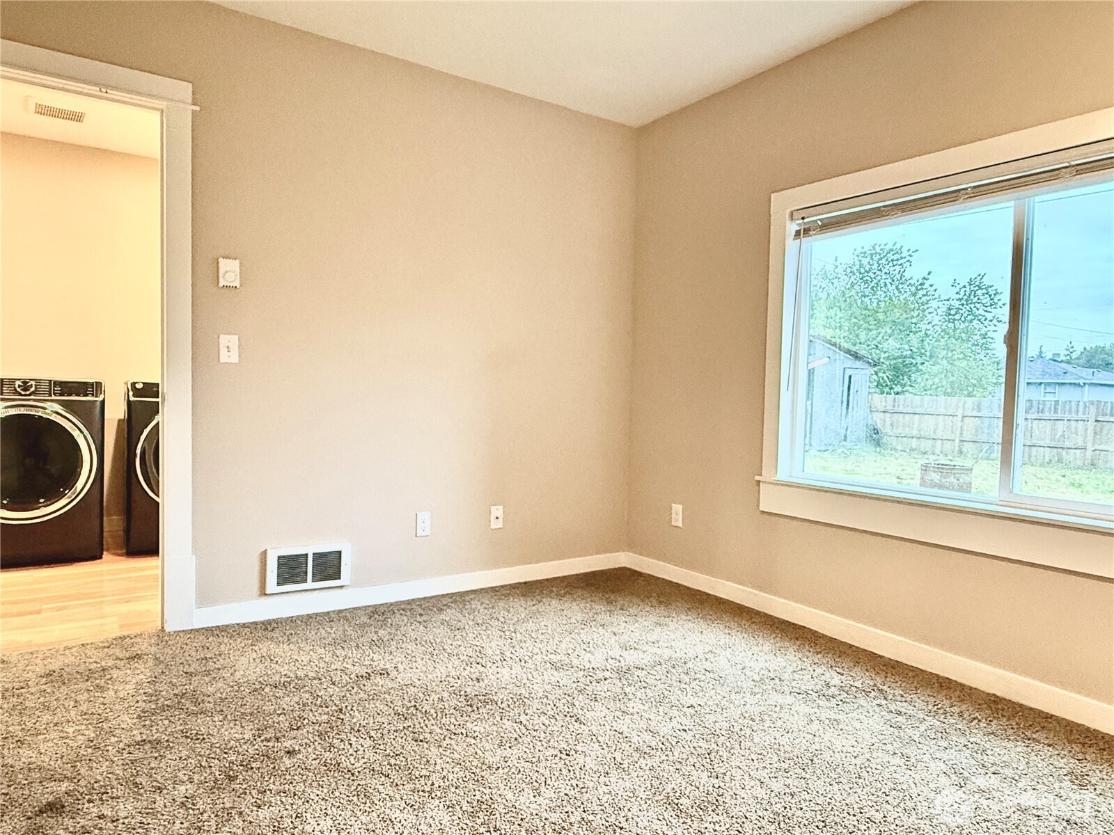 1010 Talcott Street Sedro-Woolley, WA 98284 - Photo 21 of 27 a view of a livingroom with a stove and a window