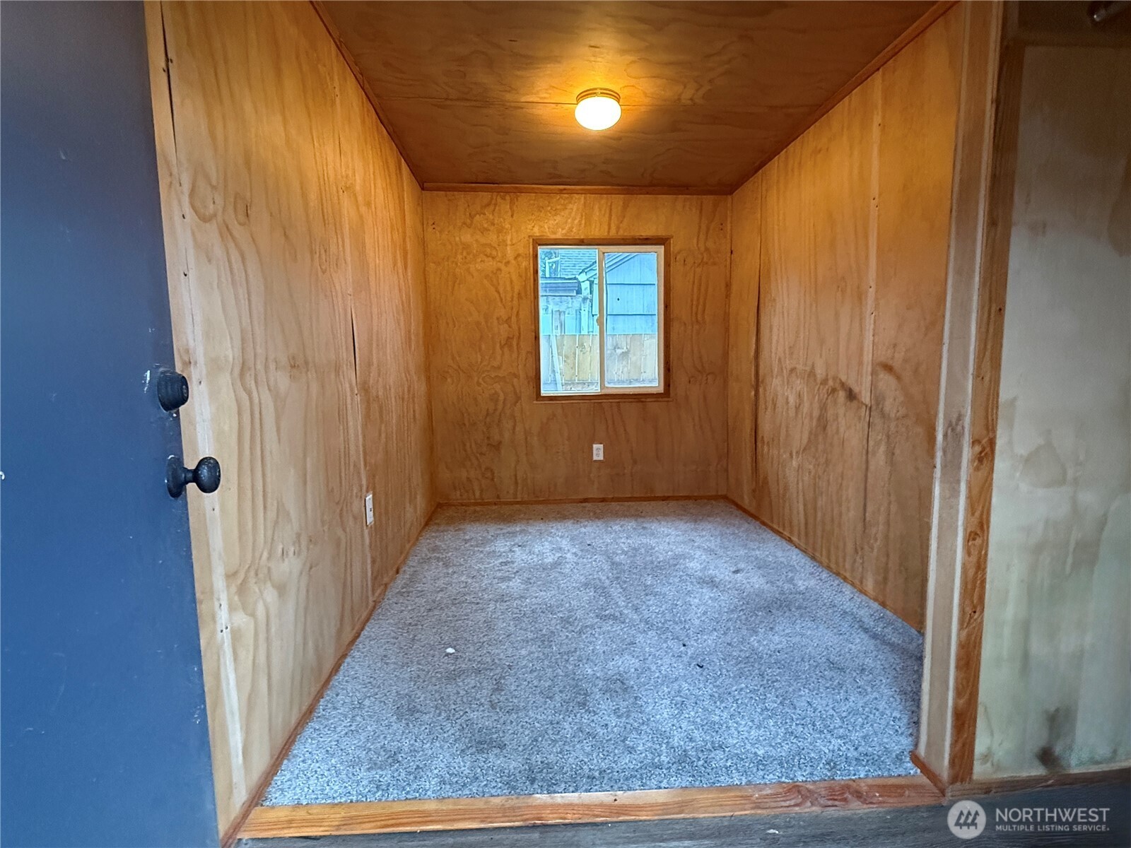 1010 Talcott Street Sedro-Woolley, WA 98284 - Photo 23 of 27 a view of an empty room with wooden floor