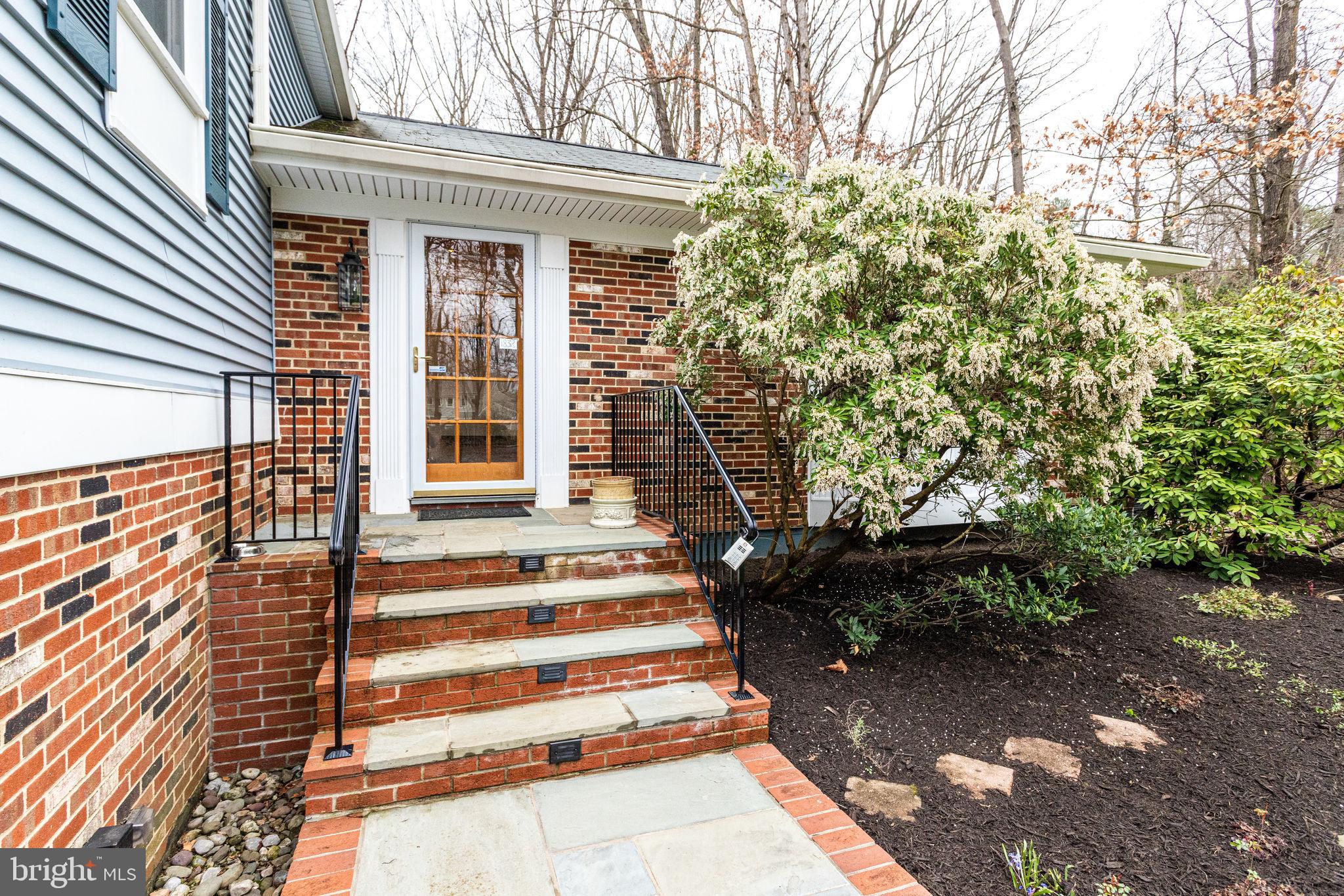 1832 Post Oak Trail Reston, VA 20191 - Photo 2 of 39 Slate walk and front porch