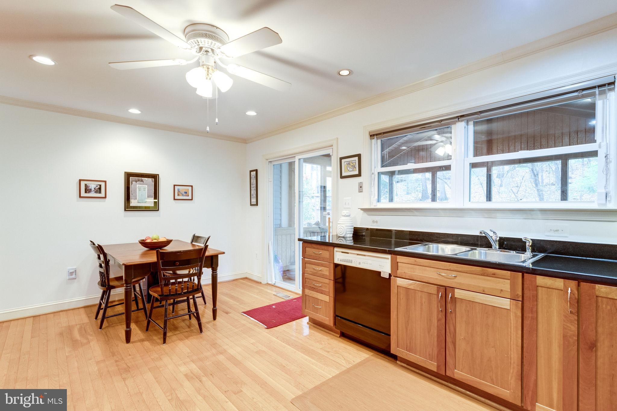 1832 Post Oak Trail Reston, VA 20191 - Photo 11 of 39 Informal dining leads to 3 season screened porch