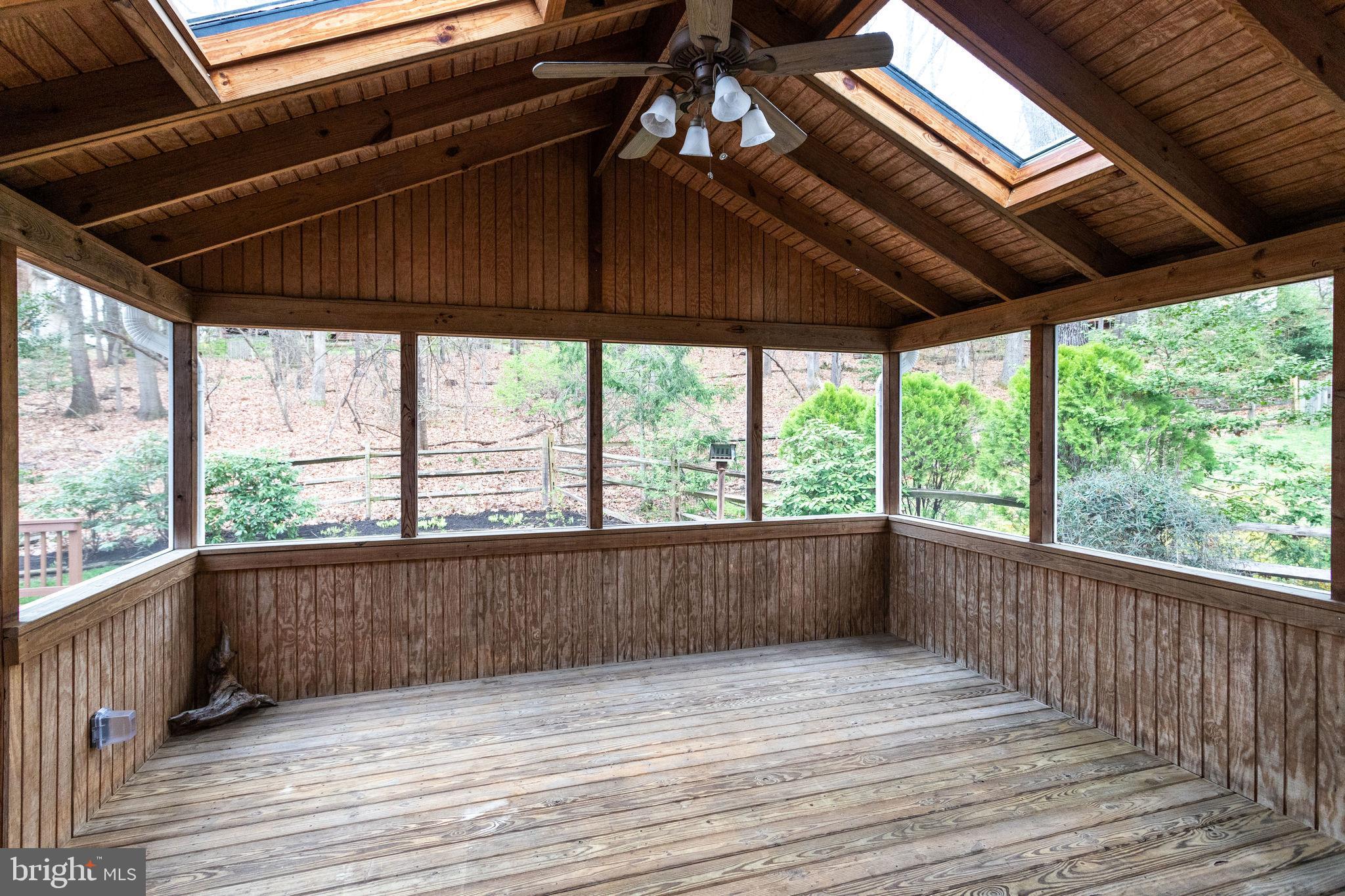 1832 Post Oak Trail Reston, VA 20191 - Photo 12 of 39 Screened porch for dining off kitchen