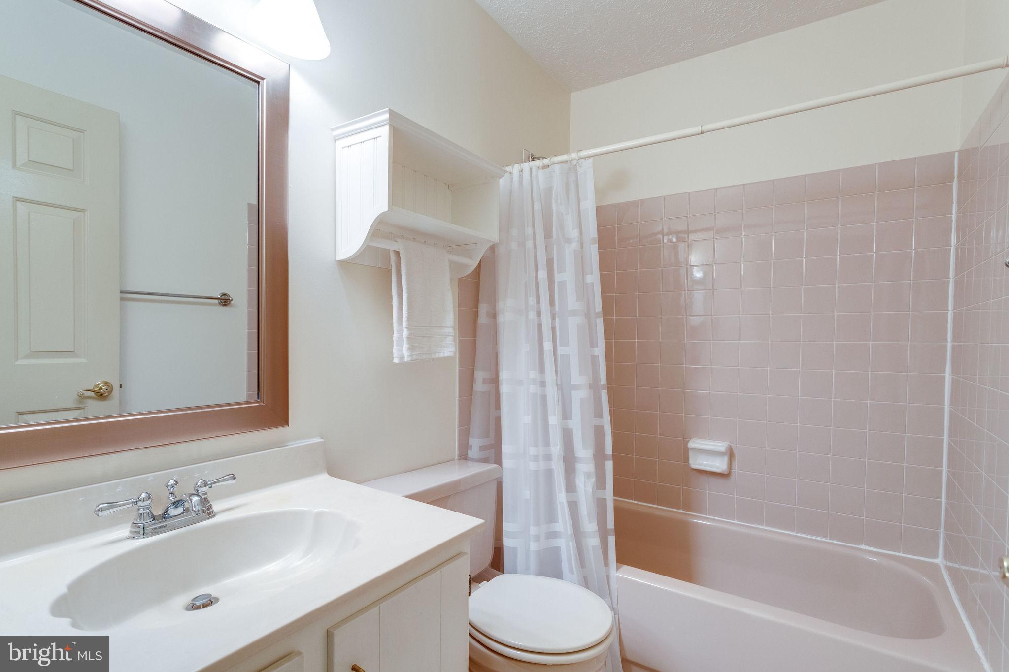 1832 Post Oak Trail Reston, VA 20191 - Photo 23 of 39 Hall bath with tub/shower