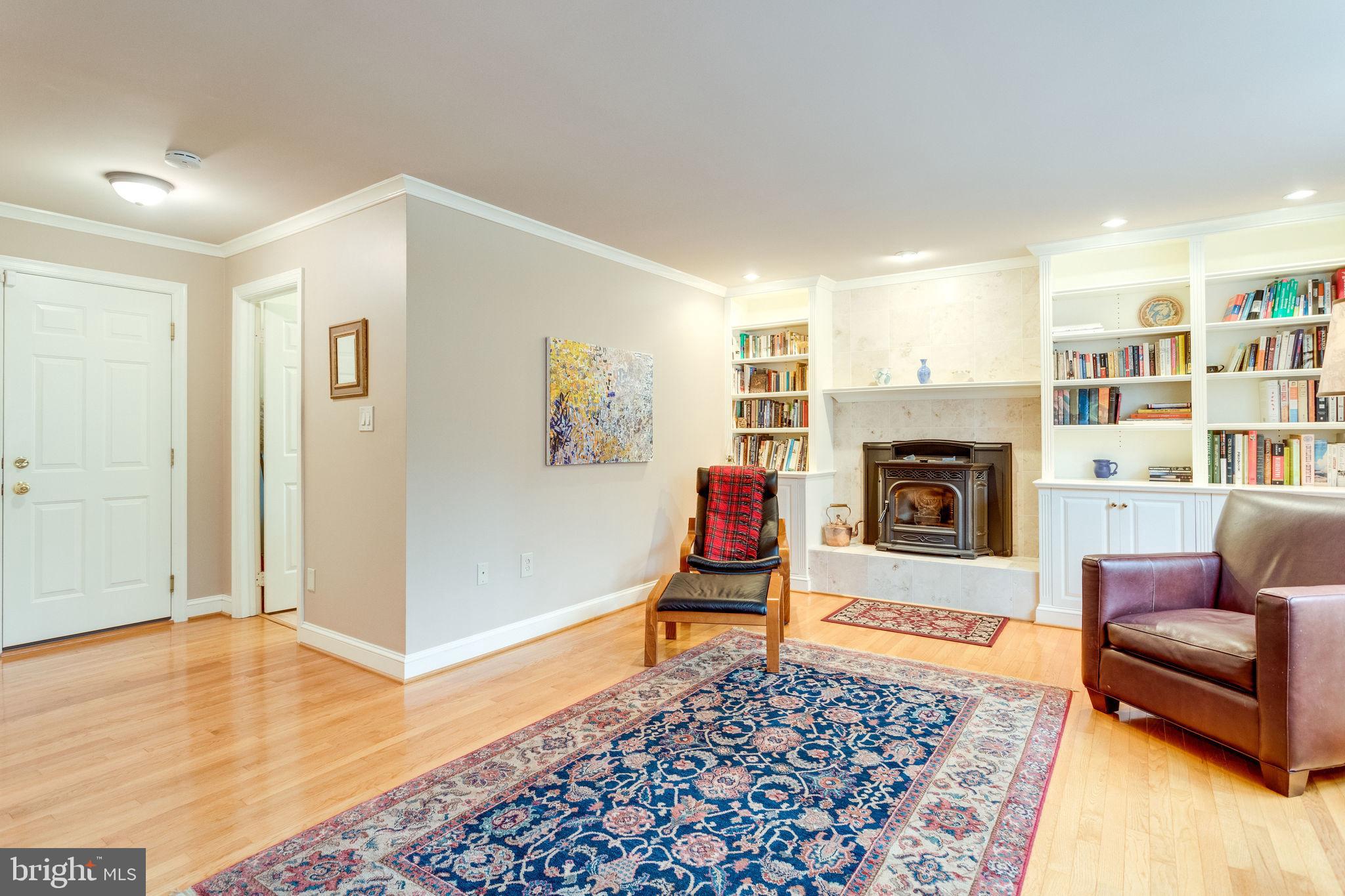 1832 Post Oak Trail Reston, VA 20191 - Photo 28 of 39 Family room with pellet stove