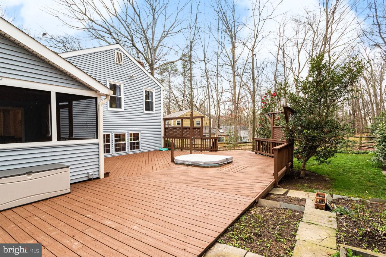1832 Post Oak Trail Reston, VA 20191 - Photo 34 of 39 Very nice deck and back yard flower garden