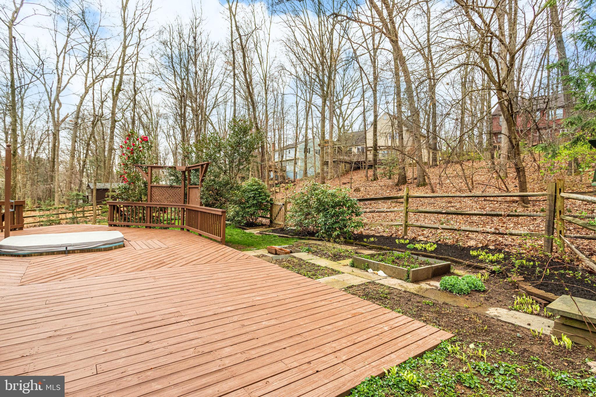 1832 Post Oak Trail Reston, VA 20191 - Photo 35 of 39 Very nice deck and back yard flower garden