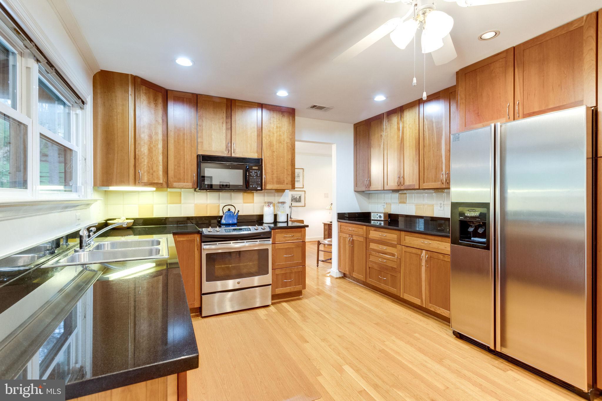 1832 Post Oak Trail Reston, VA 20191 - Photo 7 of 39 Very nice kitchen with stainless and granite
