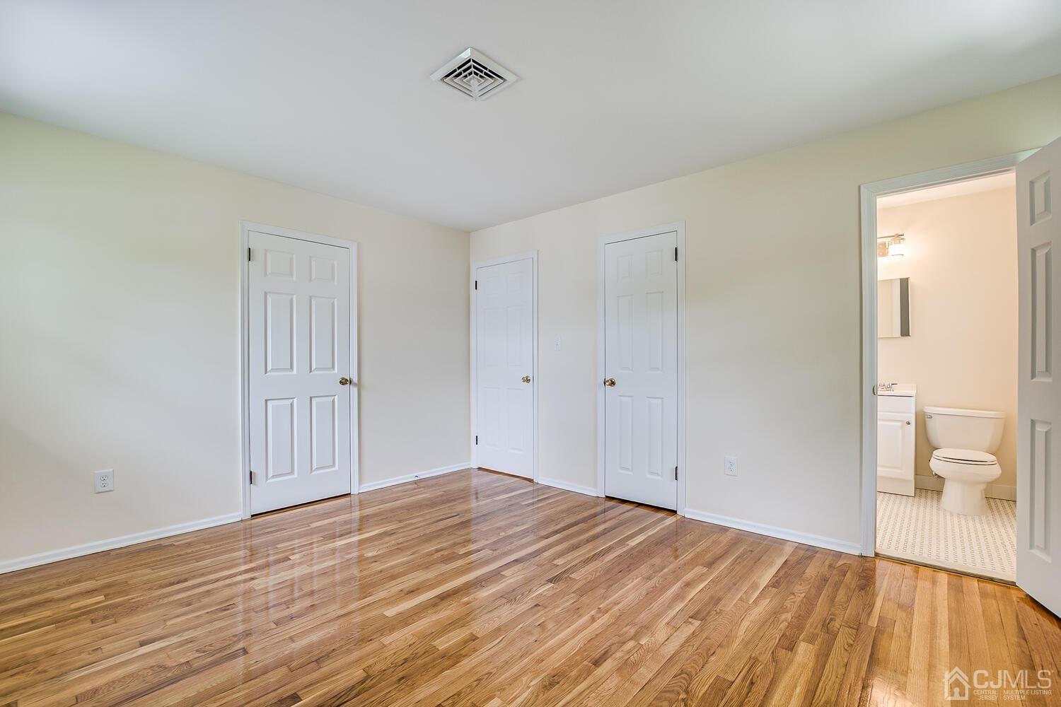 8 Eagle Road Edison, NJ 08820 - Photo 11 of 28 a view of room with wooden floor