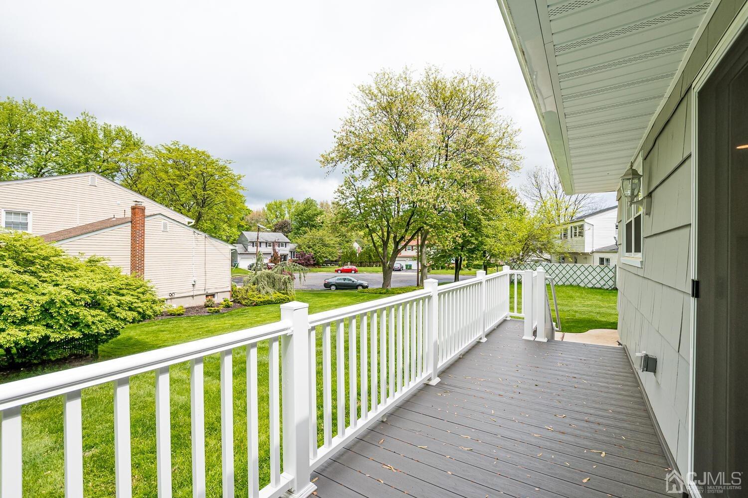 8 Eagle Road Edison, NJ 08820 - Photo 22 of 28 a view of a balcony with wooden floor