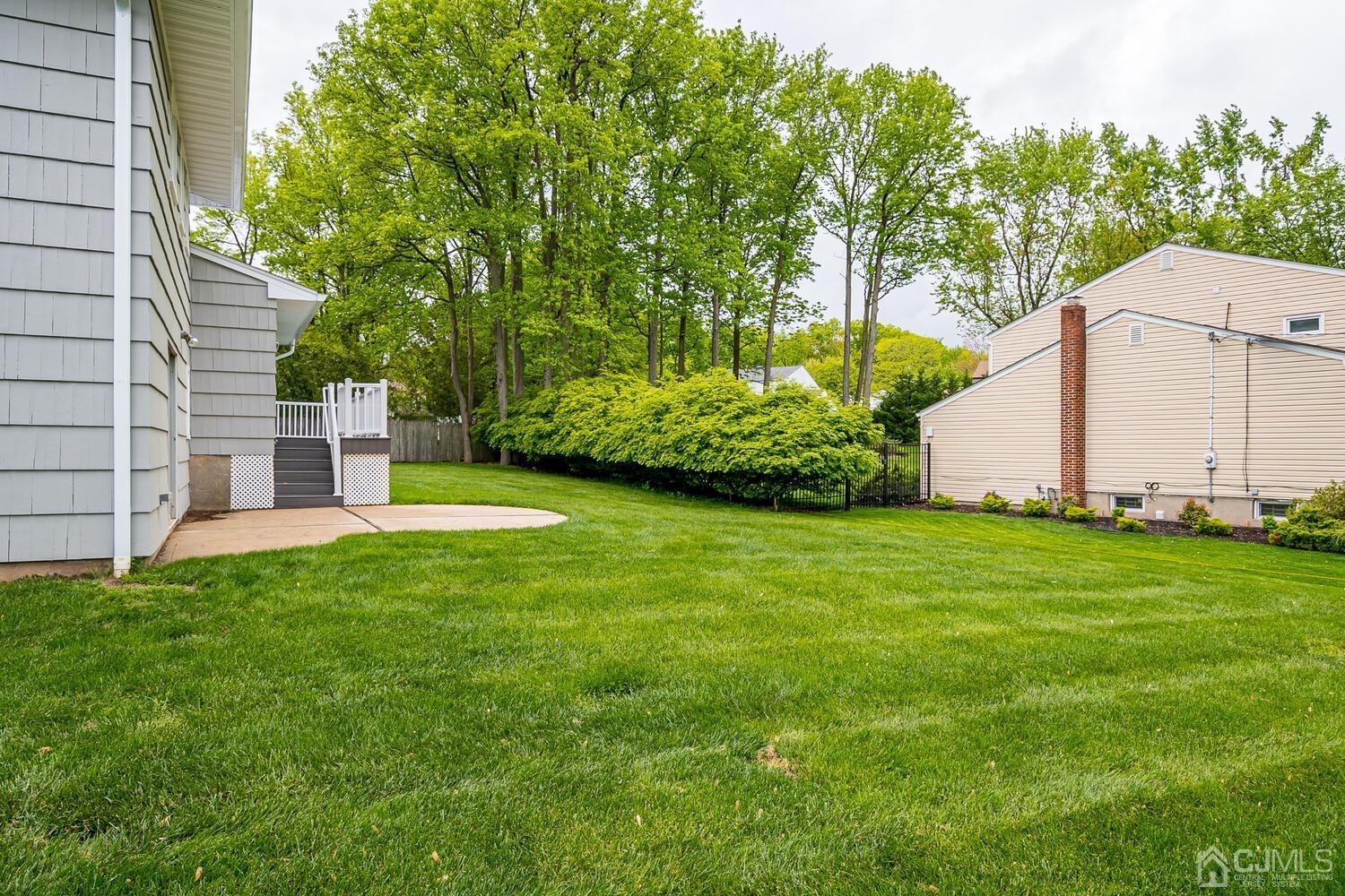 8 Eagle Road Edison, NJ 08820 - Photo 23 of 28 a view of a back yard of the house