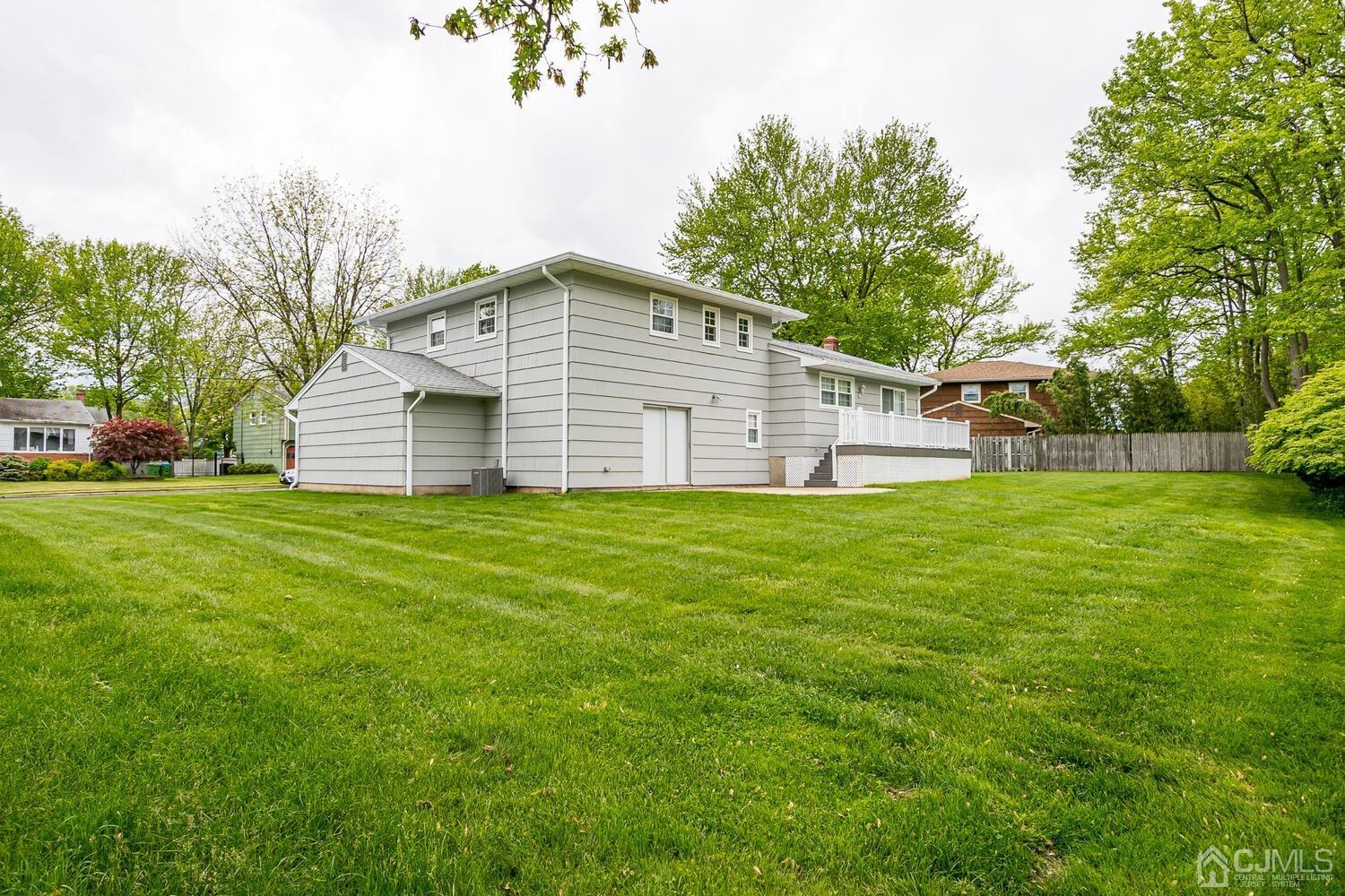 8 Eagle Road Edison, NJ 08820 - Photo 24 of 28 a view of a house with a yard