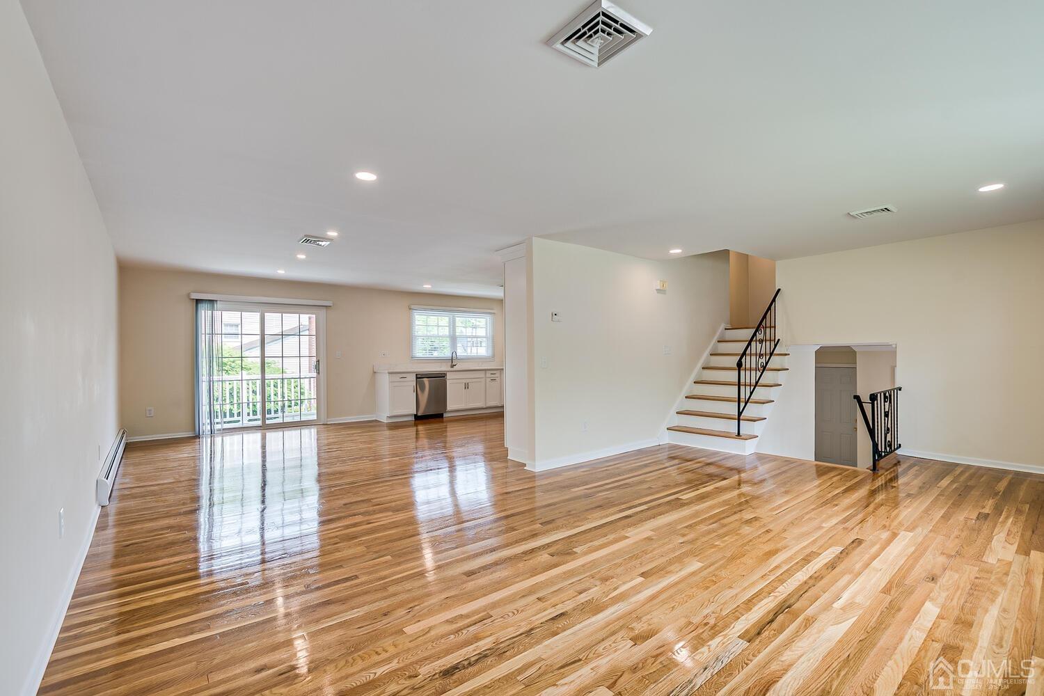 8 Eagle Road Edison, NJ 08820 - Photo 4 of 28 a view of empty room with wooden floor