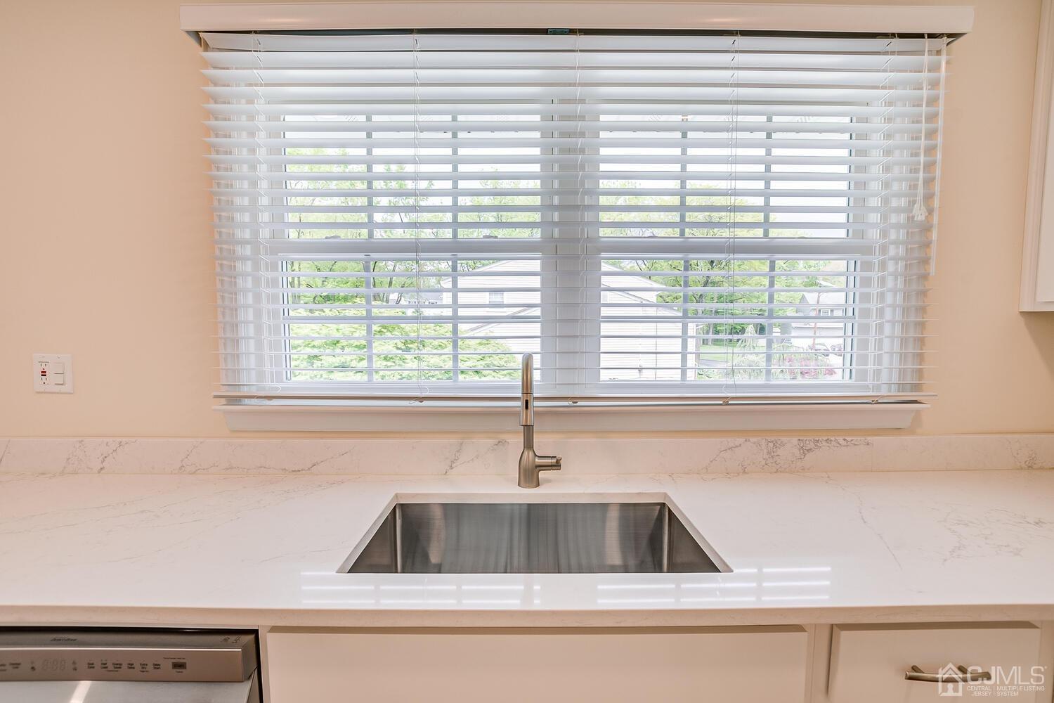 8 Eagle Road Edison, NJ 08820 - Photo 8 of 28 a kitchen with a sink and a window