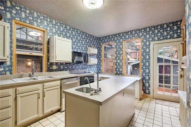 a living room with furniture or couch and a window