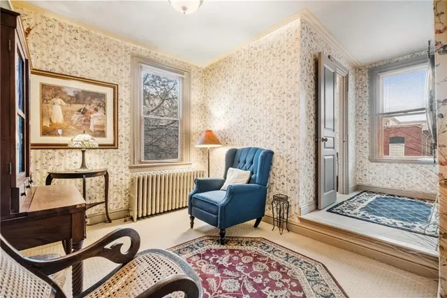 a bathroom with a toilet and a sink