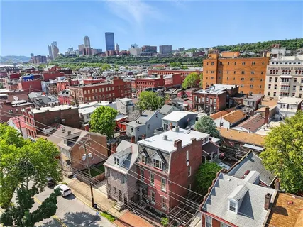a view of a city with tall buildings