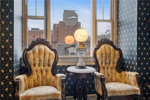 a bathroom with a toilet and a sink