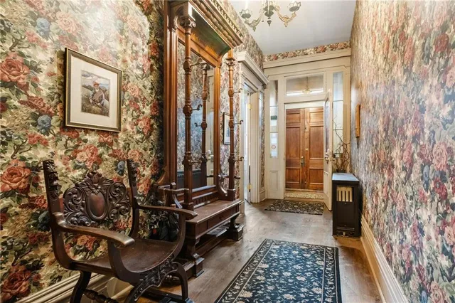 a view of a hallway with windows