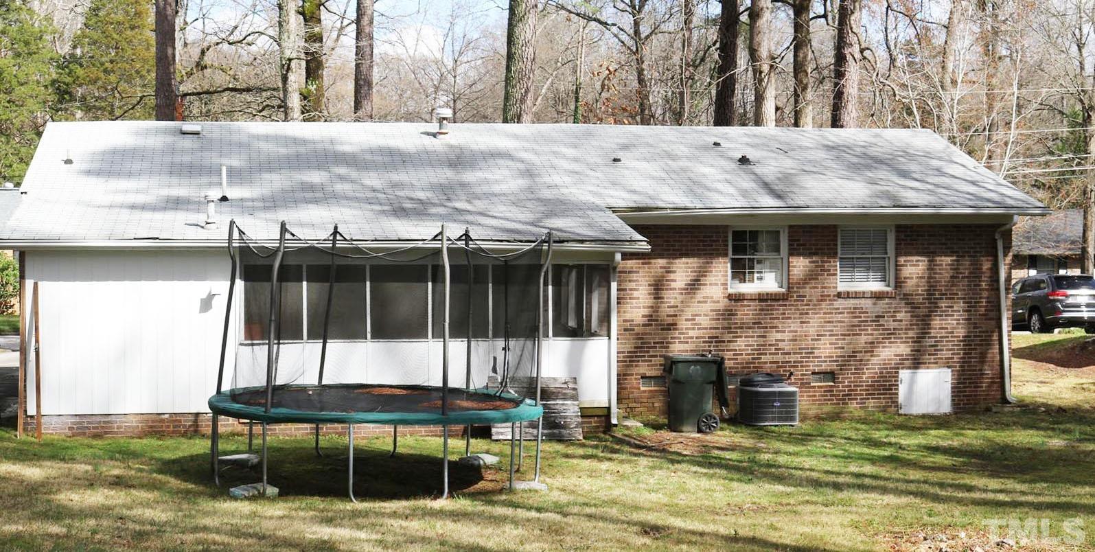 4609 Radcliff Road Raleigh, NC 27609 - Photo 3 of 15 a view of a house with backyard porch and sitting area