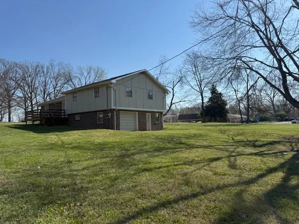 a house view with a garden space